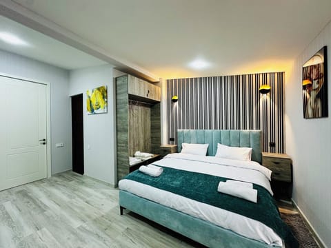 Family Quadruple Room, Balcony, City View | Desk, soundproofing, free WiFi