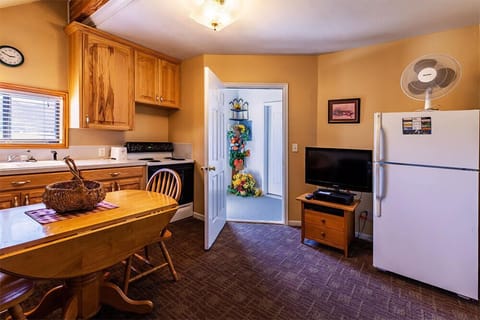 Suite, 1 Bedroom | Living area | TV