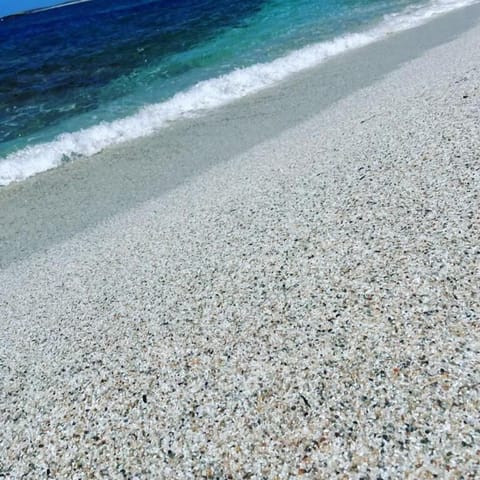 Deluxe Double Room, 1 King Bed, Non Smoking, Bathtub | Beach | Beach umbrellas