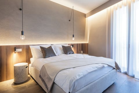 Premium bedding, down comforters, memory foam beds, in-room safe