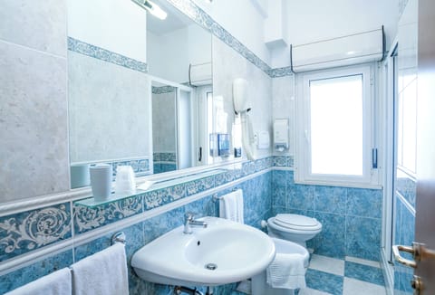 Economy Double or Twin Room, Balcony | Bathroom | Shower, hair dryer, towels, soap