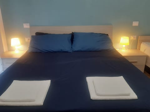 Desk, laptop workspace, free WiFi, bed sheets