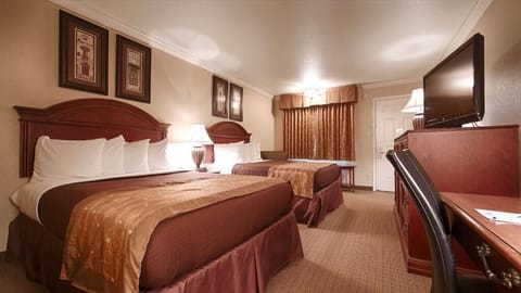 Desk, laptop workspace, blackout drapes, iron/ironing board