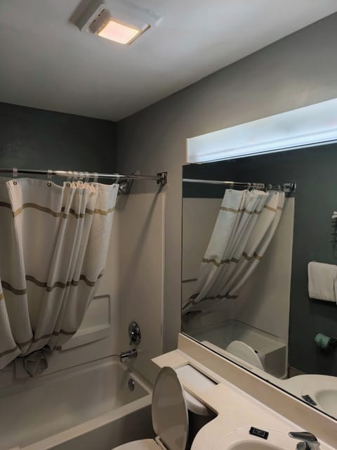 Combined shower/tub, towels, soap, toilet paper