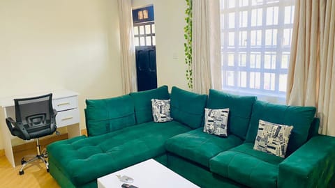 Family Apartment | Living area | 32-inch Smart TV with digital channels
