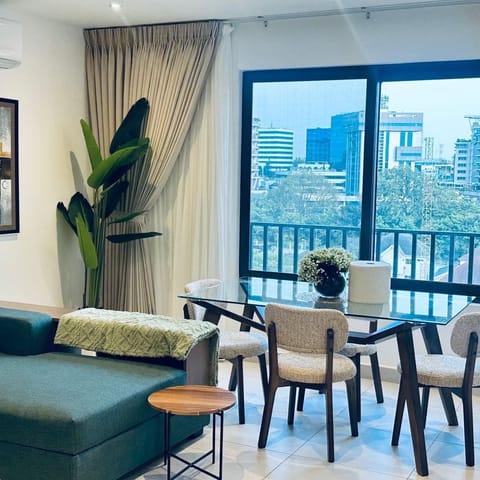 Family Apartment, Balcony, City View | Living area | Flat-screen TV