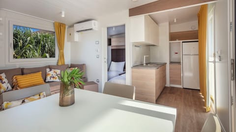 Sylva Holiday Home | Private kitchen | Fridge, microwave, highchair