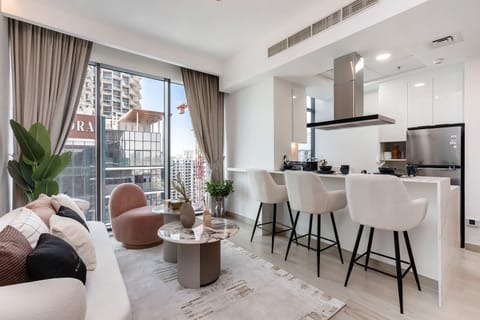 Premium Apartment, 1 Bedroom, Balcony, City View | Living area | 50-inch Smart TV with digital channels