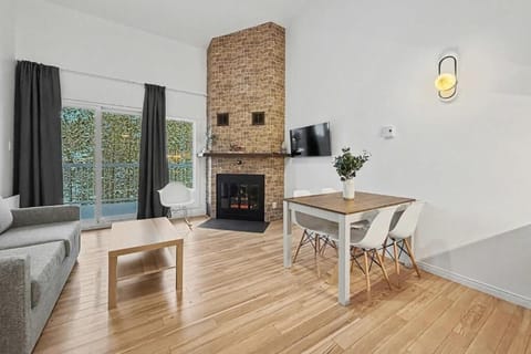Apartment, Balcony, Courtyard View | Living area | TV, fireplace