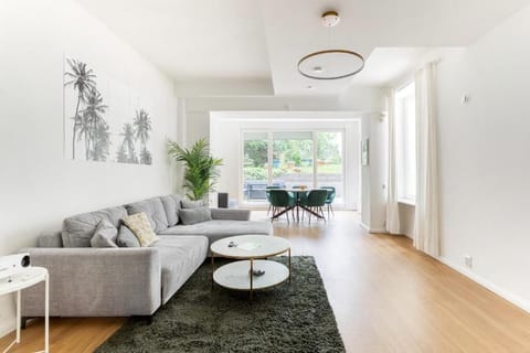 Design Condo, Kitchen, Garden View | Living area | Flat-screen TV