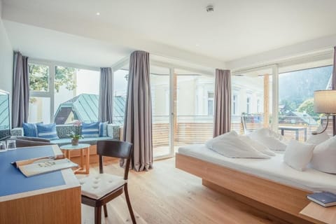 Deluxe Double Room, Balcony, Mountain View | In-room safe, desk, blackout drapes, iron/ironing board