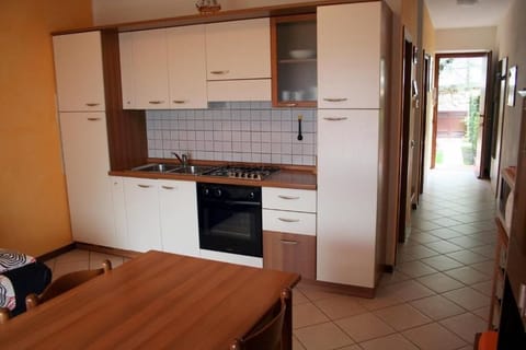 Apartment, Balcony, Lake View | Private kitchen | Highchair