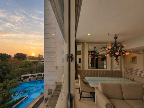 Apartment, 2 Bedrooms, City View | Living area | 43-inch Smart TV with cable channels