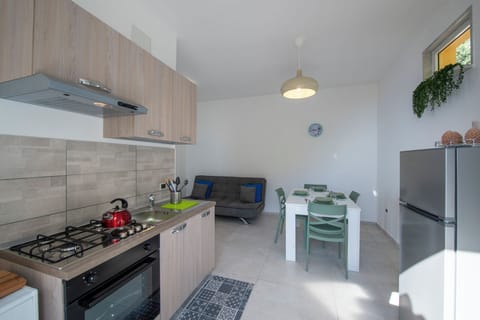 Apartment, Sea View | Private kitchen | Fridge, microwave, oven, stovetop