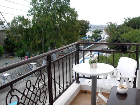 Basic Double Room, Balcony, City View | Outdoor dining