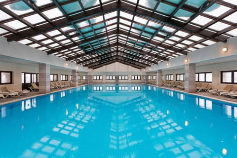 Indoor pool, open 10:00 AM to 10:00 PM, sun loungers, lifeguards on site