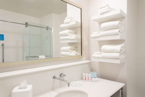 Shower, hair dryer, bathrobes, towels