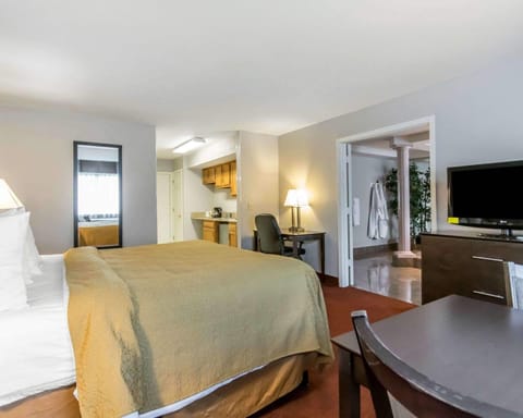 Desk, blackout drapes, iron/ironing board, free cribs/infant beds