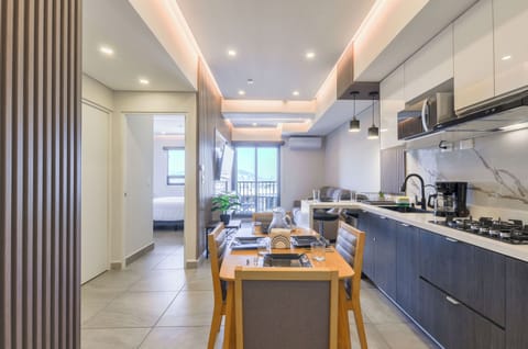 Comfort Suite, Balcony, City View | Living area | 55-inch Smart TV with digital channels, streaming services