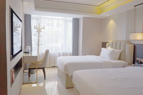 Luxury Twin Room, City View | Desk, laptop workspace, blackout drapes, free WiFi