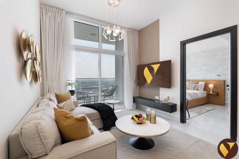 Standard Apartment, 1 King Bed with Sofa bed, Balcony, City View | Living area | 65-inch Smart TV with cable channels
