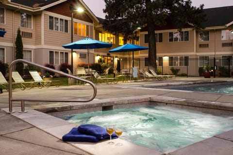 Seasonal outdoor pool, open 8:00 AM to 10:00 PM, pool umbrellas
