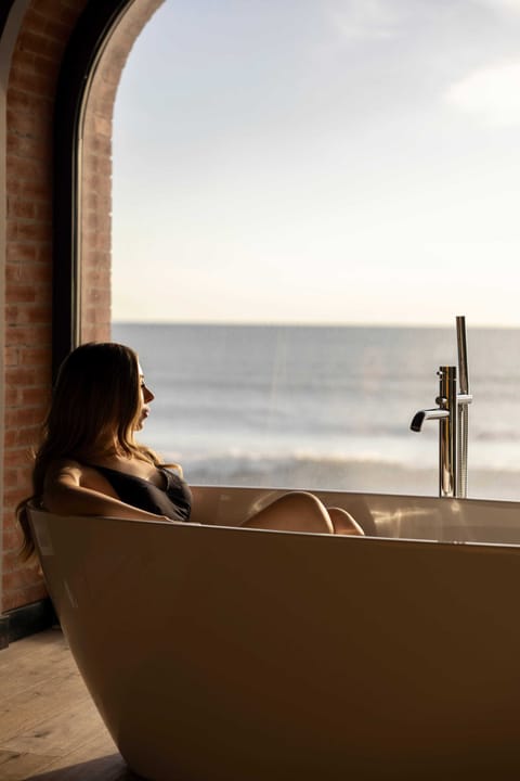 Panoramic Suite, Sea View | Bathroom | Hair dryer, towels, soap, shampoo