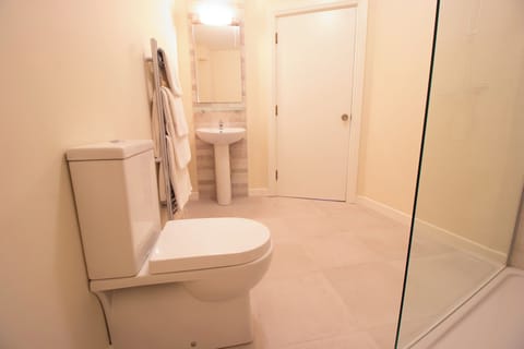 Shower, towels, soap, shampoo