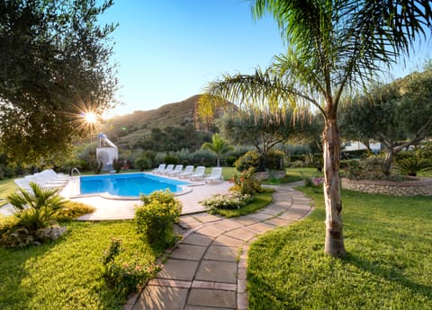 Seasonal outdoor pool, a rooftop pool, pool umbrellas, sun loungers
