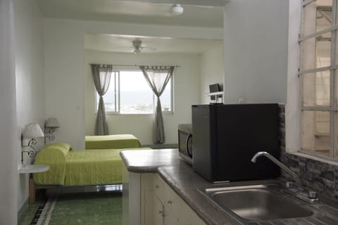 Family Suite, 2 Double Beds | Premium bedding, in-room safe, desk, free WiFi