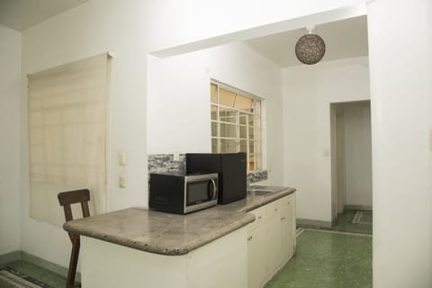 Family Suite, 2 Double Beds | Private kitchenette | Mini-fridge