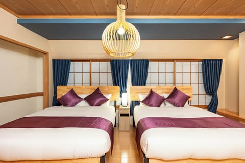 Family Apartment, 3 Bedrooms, Non Smoking, Private Bathroom | Blackout drapes, iron/ironing board, WiFi (free), bed sheets