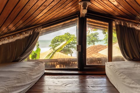 Family Room, Balcony, Partial Sea View | Minibar, free WiFi