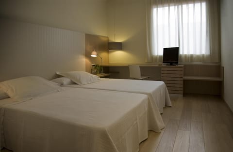 Minibar, desk, laptop workspace, blackout drapes