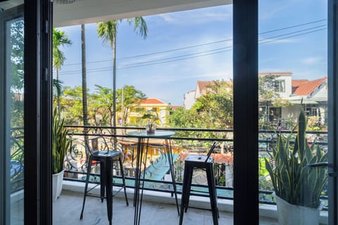 Deluxe Quadruple Room, Balcony, Garden View | Interior