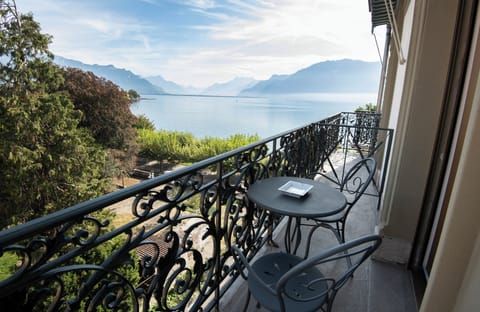 Junior Room, Balcony, Partial Lake View | Property grounds