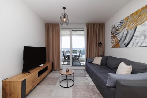 Apartment, Balcony, Sea View | Living area | 40-inch LED TV with digital channels, Netflix, streaming services