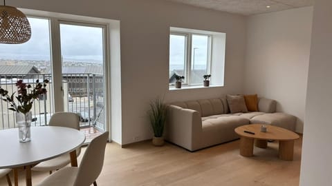 Classic Apartment, 2 Bedrooms, Balcony | Living area | 55-inch Smart TV with digital channels, heated floors