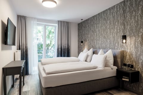 Deluxe Apartment, Balcony, Mountain View | In-room safe, individually decorated, individually furnished