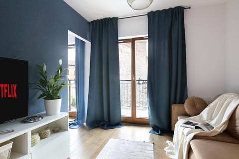 Apartment, Balcony, Garden View | Living area | Flat-screen TV