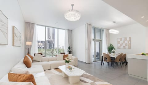 Luxury Apartment, Balcony, City View | Living area | 65-inch Smart TV with cable channels