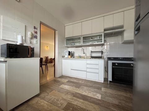 Mini-fridge, microwave, oven, cookware/dishes/utensils