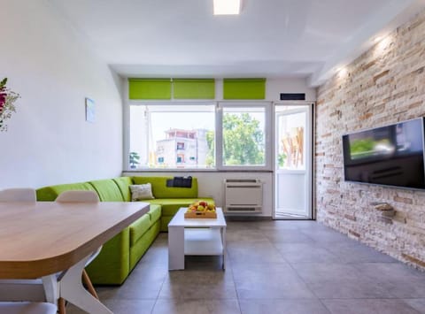Apartment (Two Bedroom Apartment) | Living room | 32-inch flat-screen TV with cable channels