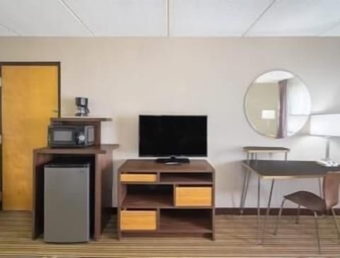 Blackout drapes, iron/ironing board, free cribs/infant beds