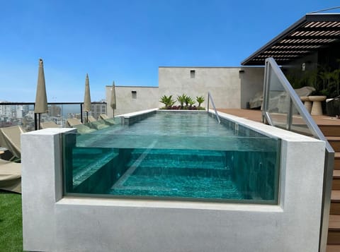 Outdoor pool, open 8:00 AM to 10:00 PM, pool umbrellas, sun loungers