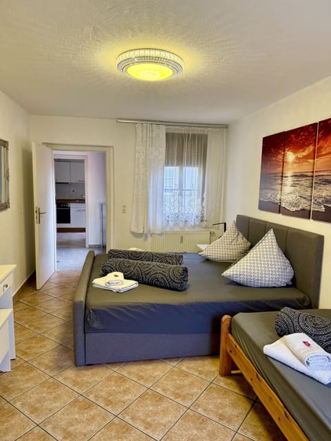 Comfort Condo, 1 Bedroom, Balcony, Garden Area (Wohnung 2) | Desk, laptop workspace, blackout drapes, soundproofing