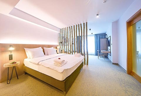 Deluxe Double Room, Courtyard View | Desk, laptop workspace, blackout drapes, WiFi (free)