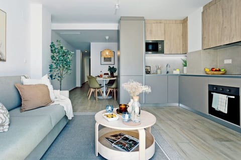 Family Apartment, Balcony | Living area | Flat-screen TV