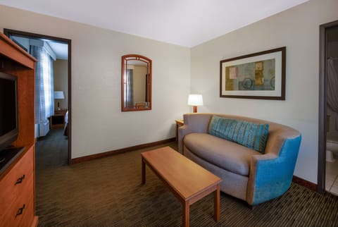 Suite, 1 Bedroom, Non Smoking (1 King Bed) | In-room safe, desk, iron/ironing board, free cribs/infant beds