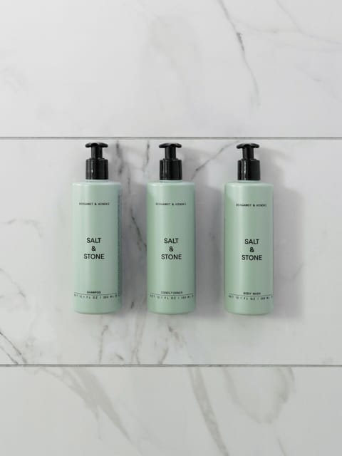 Shower, rainfall showerhead, designer toiletries, hair dryer